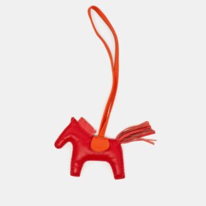 hermes cornaline/cuivre milo leather grigri rodeo bag charm pm