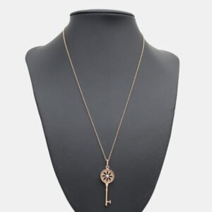 Tiffany & Co. 18K Yellow Gold 0.04 Ct Diamond Daisy Key Pendant Necklace